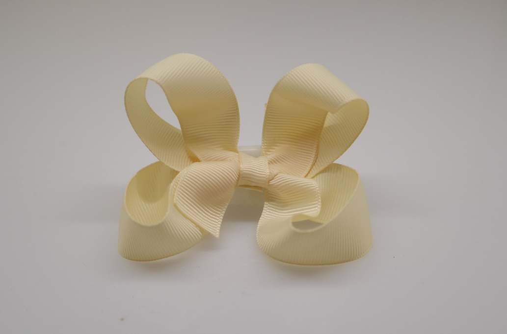 Large pinwheel hair Bow with colors  Ivory